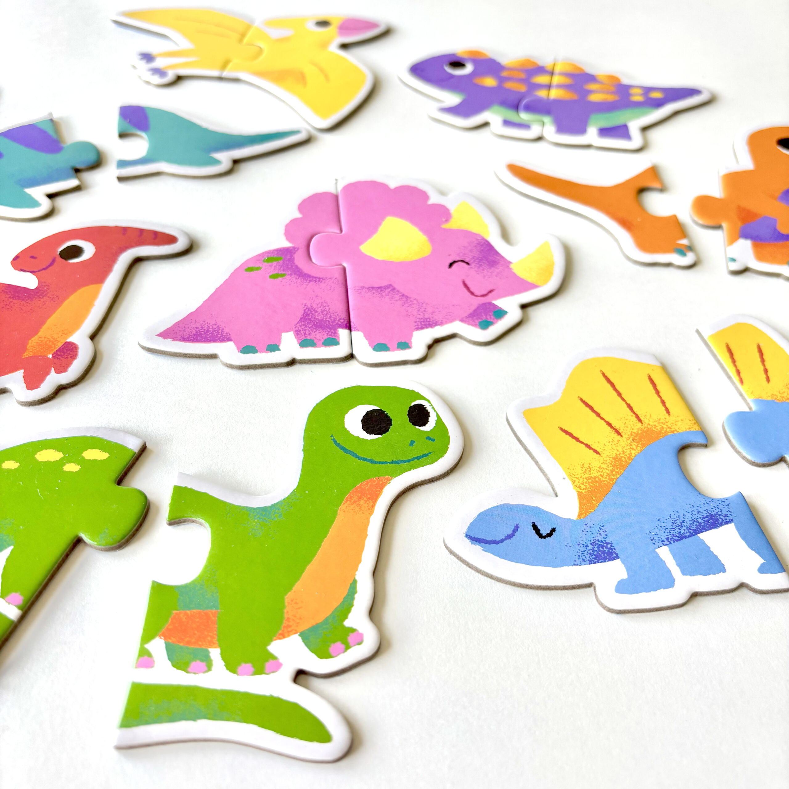 Dino Duo puzzle game, illustrated by Anna Hurley