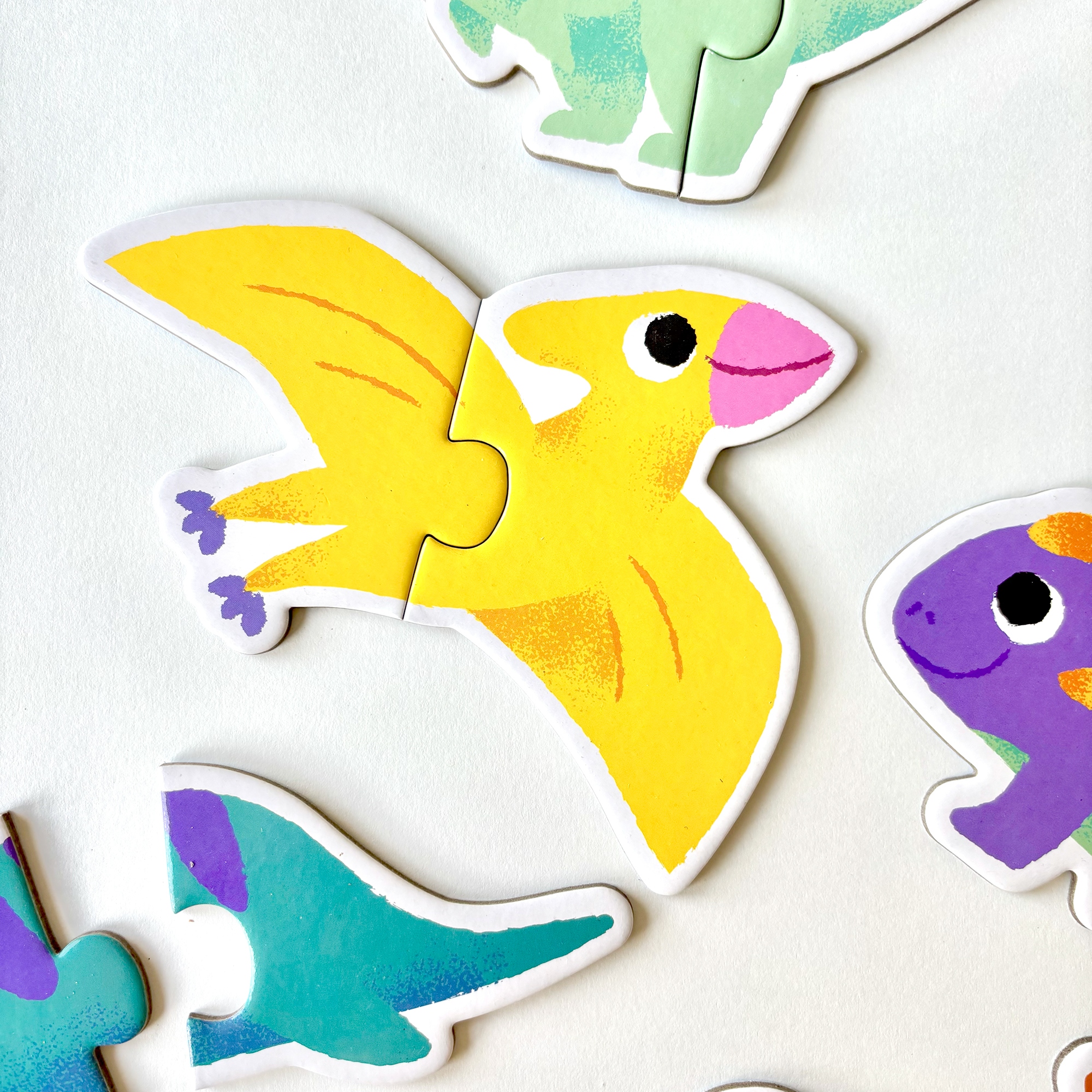 Dino Duo puzzle game, illustrated by Anna Hurley